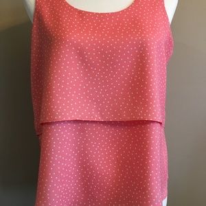 Coral color top with tiny white polka dots